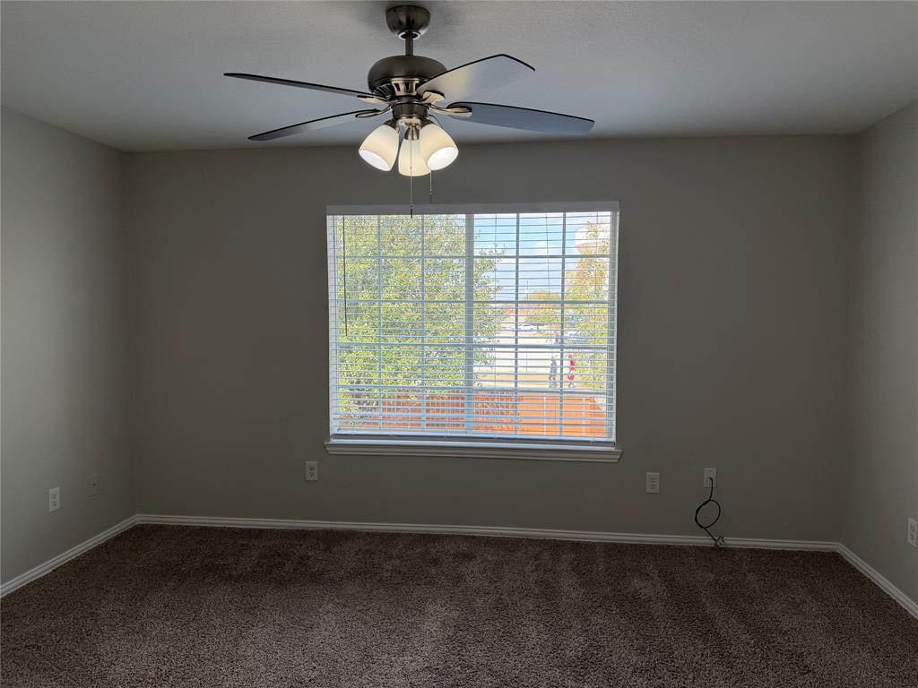 4005 Preferred Place Dallas, TX 75237 - Photo 23 of 31 a view of an empty room with a window