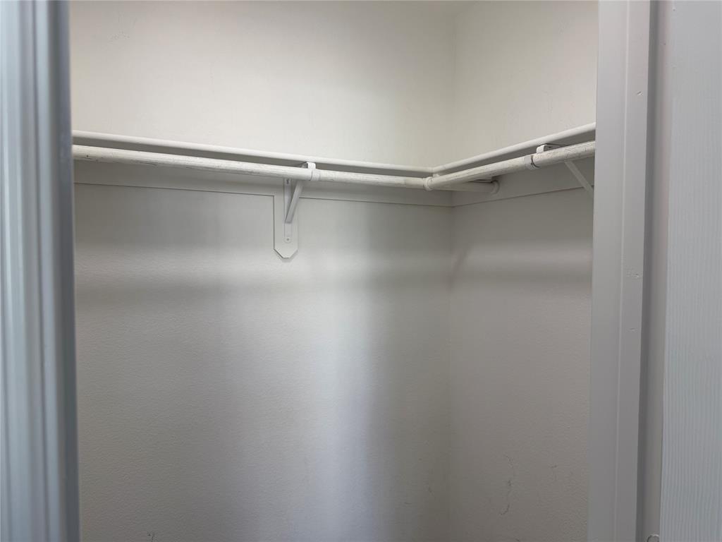 4005 Preferred Place Dallas, TX 75237 - Photo 24 of 31 a view of an empty walk in closet