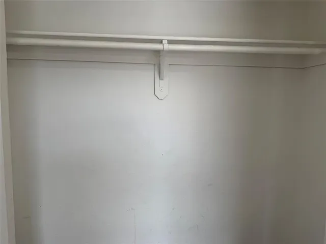 a backyard of a house with barbeque oven