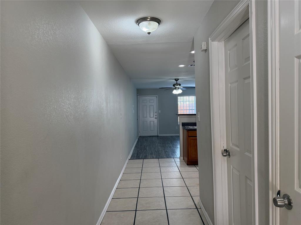 4005 Preferred Place Dallas, TX 75237 - Photo 3 of 31 wooden floor with a kitchen