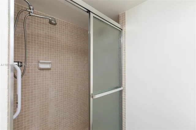 a bathroom with a bathtub and a sink