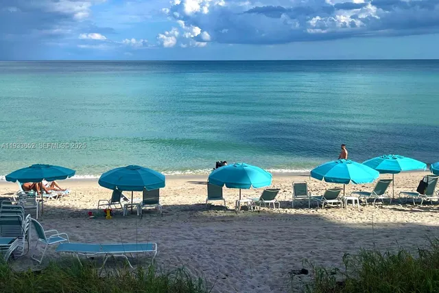 a view of a swimming pool and outdoor space