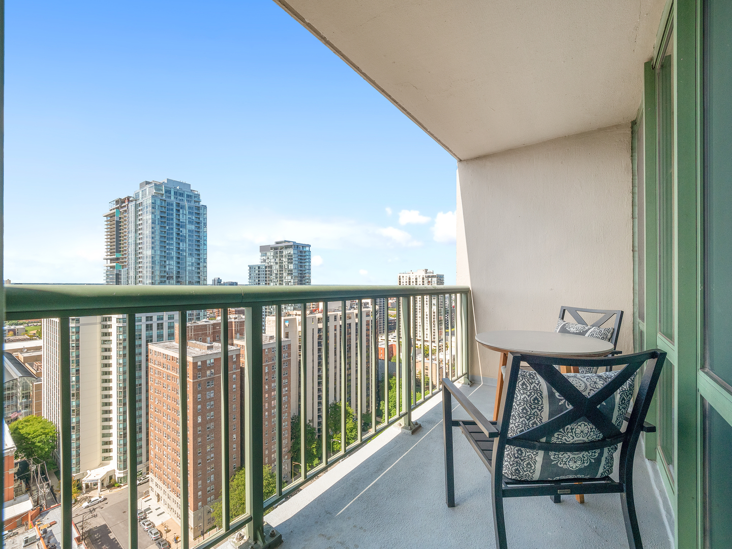 111 West Maple Street, Unit 2010 Chicago, IL 60610 - Photo 13 of 20 a view of a balcony with furniture