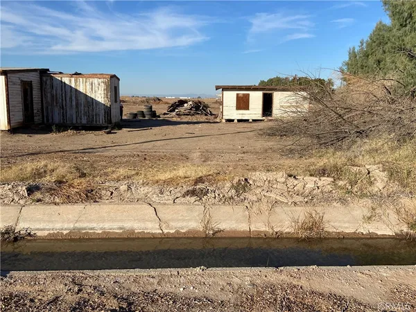 a view of a yard next to a yard
