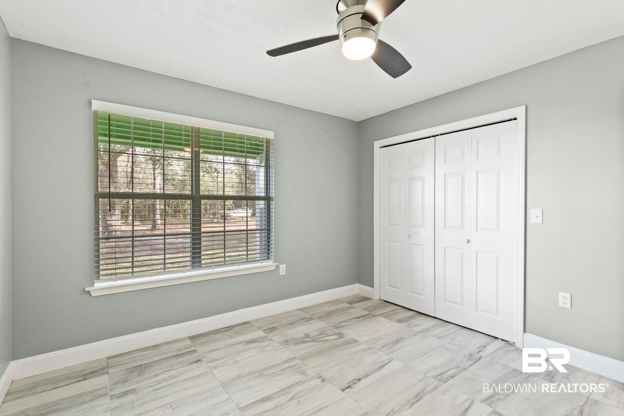 17366 Old Brady Road Bay Minette, AL 36507 - Photo 25 of 43 Unfurnished bedroom with a ceiling fan and a closet