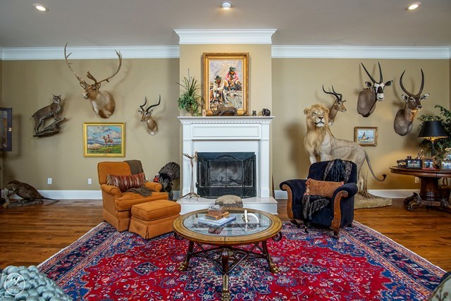 6620 Colaparchee Road Macon, GA 31210 - Photo 13 of 45 a living room with furniture and a fireplace