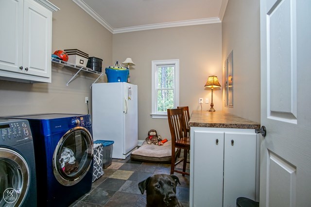 6620 Colaparchee Road Macon, GA 31210 - Photo 27 of 45 a utility room with sink dryer and washer