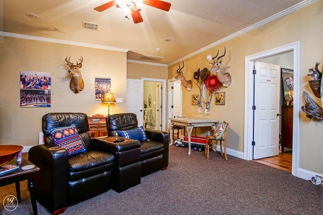 6620 Colaparchee Road Macon, GA 31210 - Photo 31 of 45 a living room with furniture and a couch