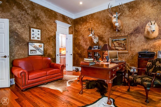 6620 Colaparchee Road Macon, GA 31210 - Photo 35 of 45 a living room with furniture and wooden floor