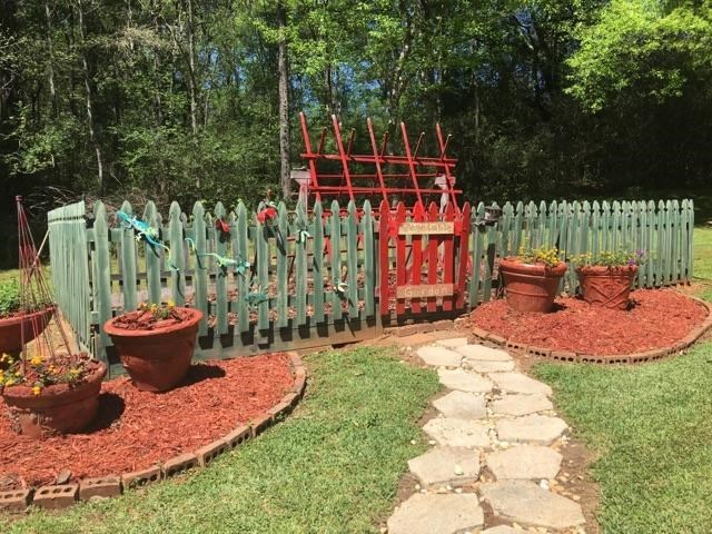 6620 Colaparchee Road Macon, GA 31210 - Photo 44 of 45 a view of a backyard with sitting area and furniture