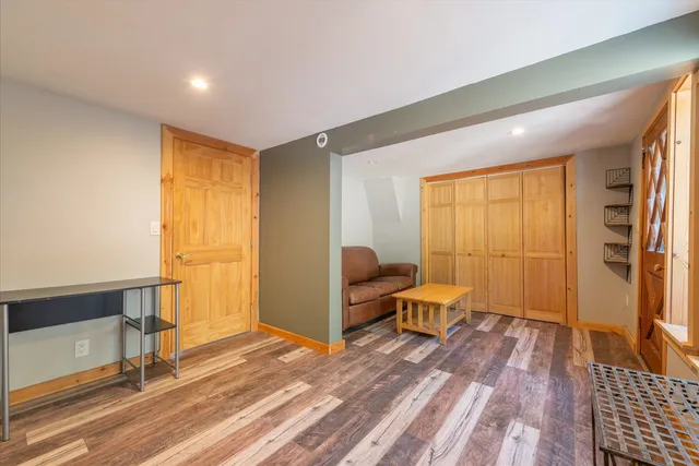 a bathroom with a toilet a sink and shower