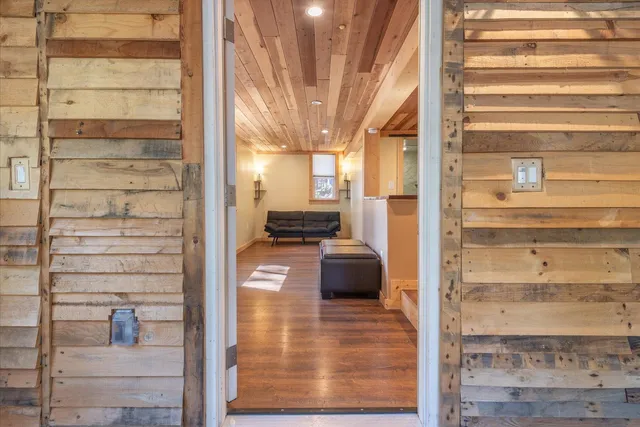 a view of a chairs and table in backyard