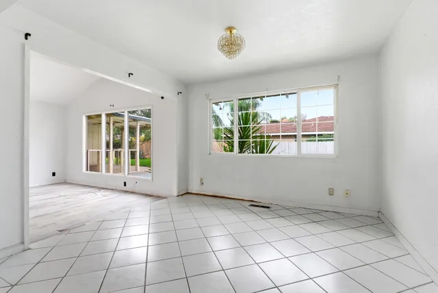 an empty room with windows