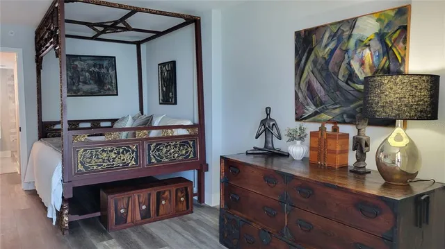 a view of a livingroom with furniture and flat screen tv