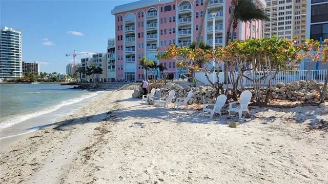a view of a swimming pool with a lounge chair