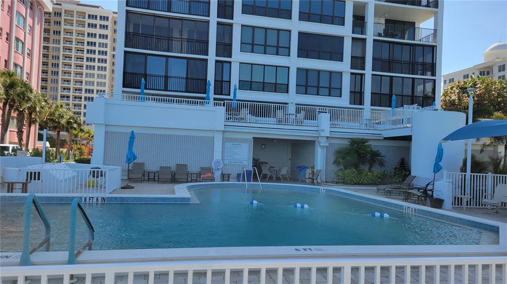 11 Sunset Drive, Unit 704 Sarasota, FL 34236 - Photo 29 of 34 a view of a building with a outdoor space