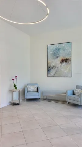 a view of workspace with furniture and window