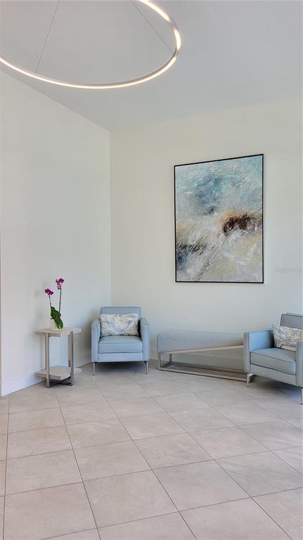 11 Sunset Drive, Unit 704 Sarasota, FL 34236 - Photo 3 of 34 a view of workspace with furniture and window