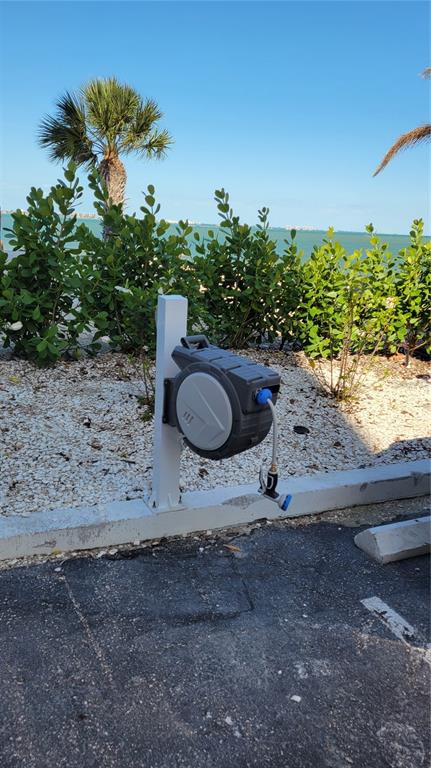 11 Sunset Drive, Unit 704 Sarasota, FL 34236 - Photo 32 of 34 a view of a dry yard with wooden fence