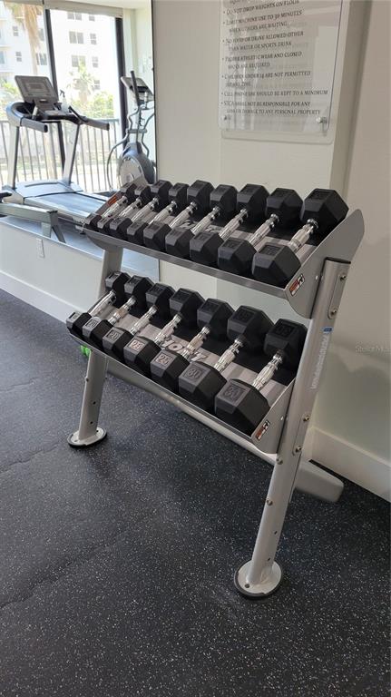 11 Sunset Drive, Unit 704 Sarasota, FL 34236 - Photo 34 of 34 a kitchen with a stove and a sink
