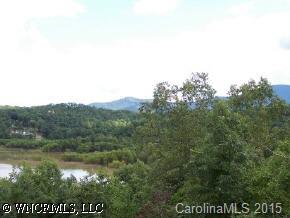 25 Fallen Tree Lane Mill Spring, NC 28756 - Photo 3 of 4 a view of a lake