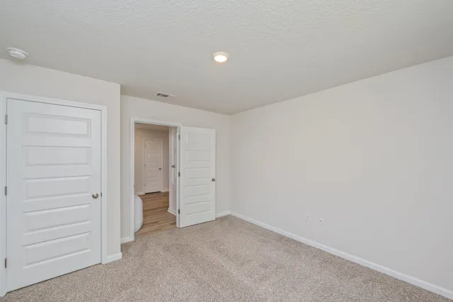 wooden floor and cabinet in a room