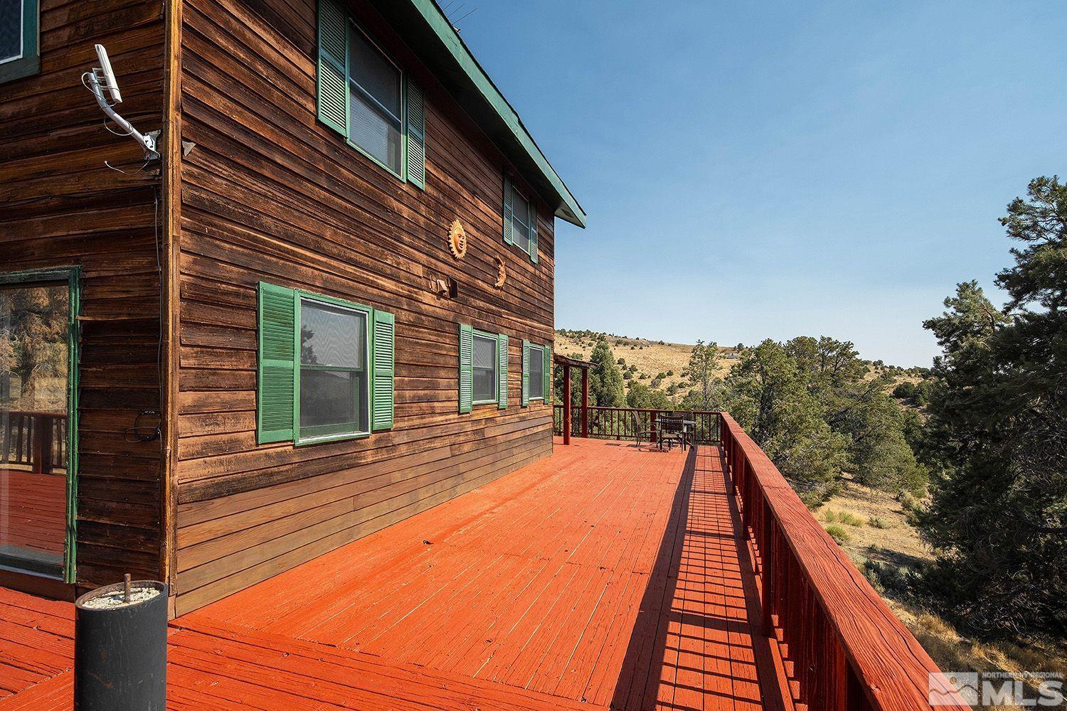 2445 Adobe Reno, NV 89521 - Photo 8 of 27 a view of a house with backyard and trees
