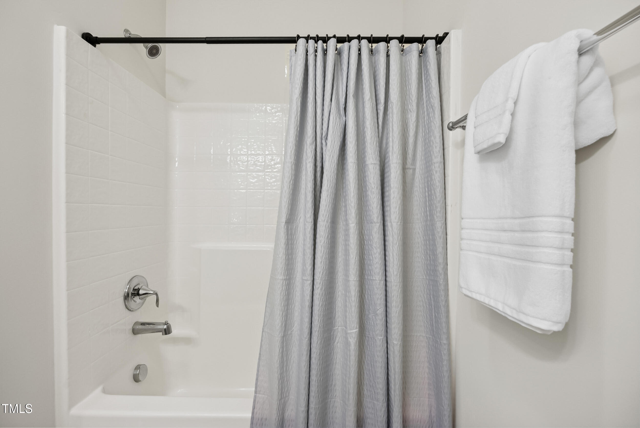 16 Daly Court Durham, NC 27705 - Photo 19 of 35 a bathroom with a shower and a tub