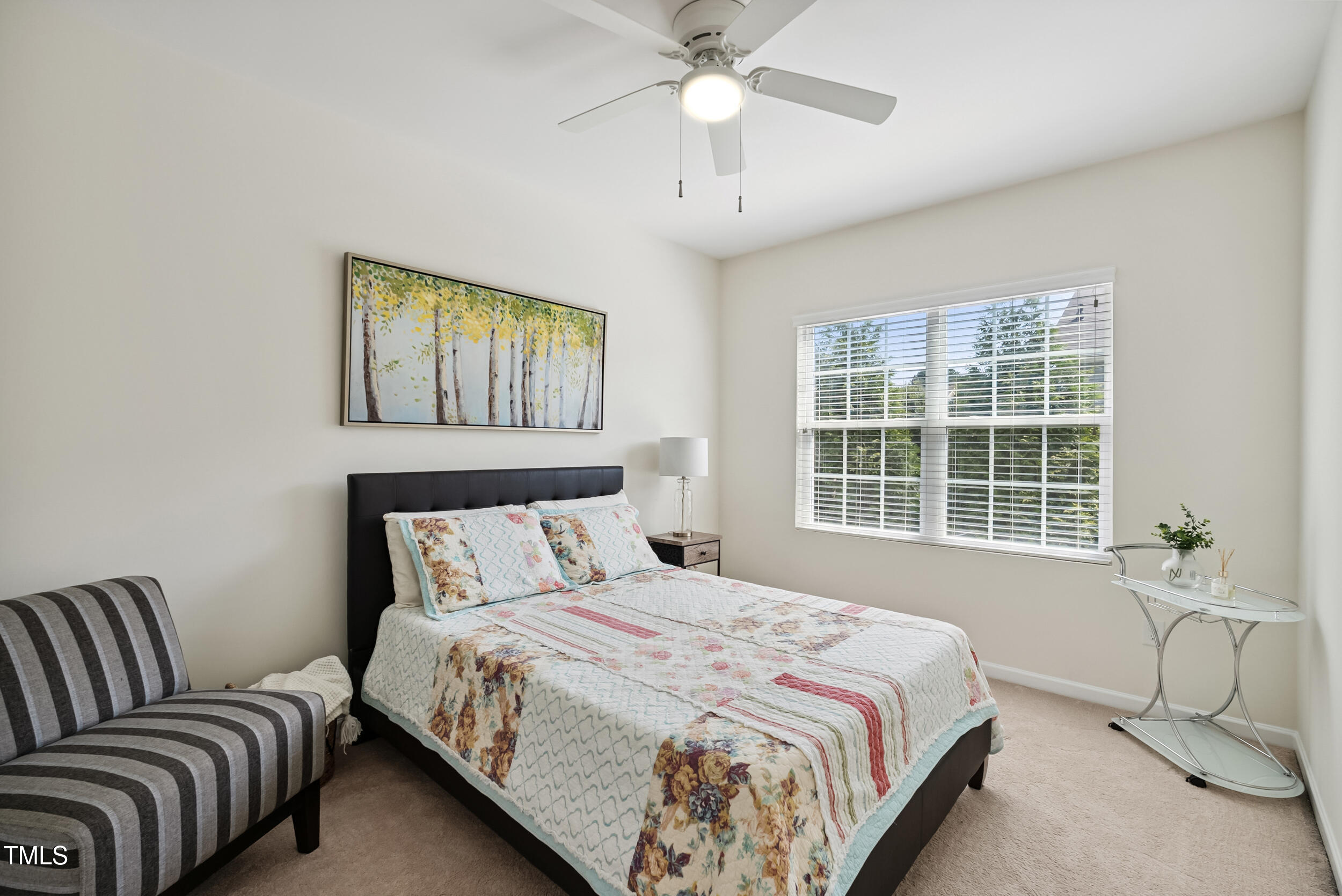 16 Daly Court Durham, NC 27705 - Photo 21 of 35 a bedroom with a bed couch and window