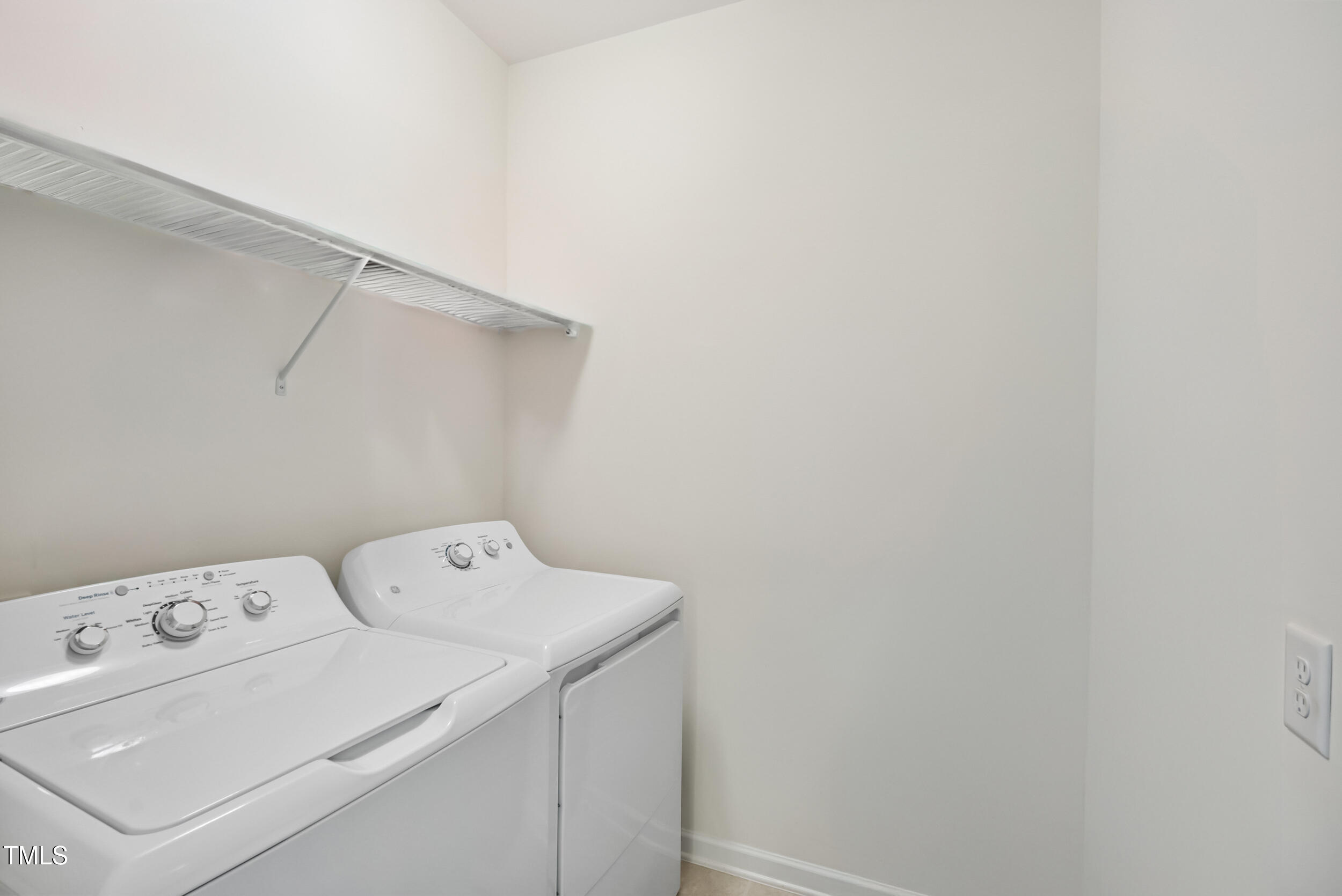 16 Daly Court Durham, NC 27705 - Photo 23 of 35 a utility room with dryer and washer