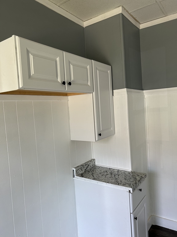 385 Orange Street Springfield, MA 01108 - Photo 6 of 11 a kitchen with a sink and cabinets