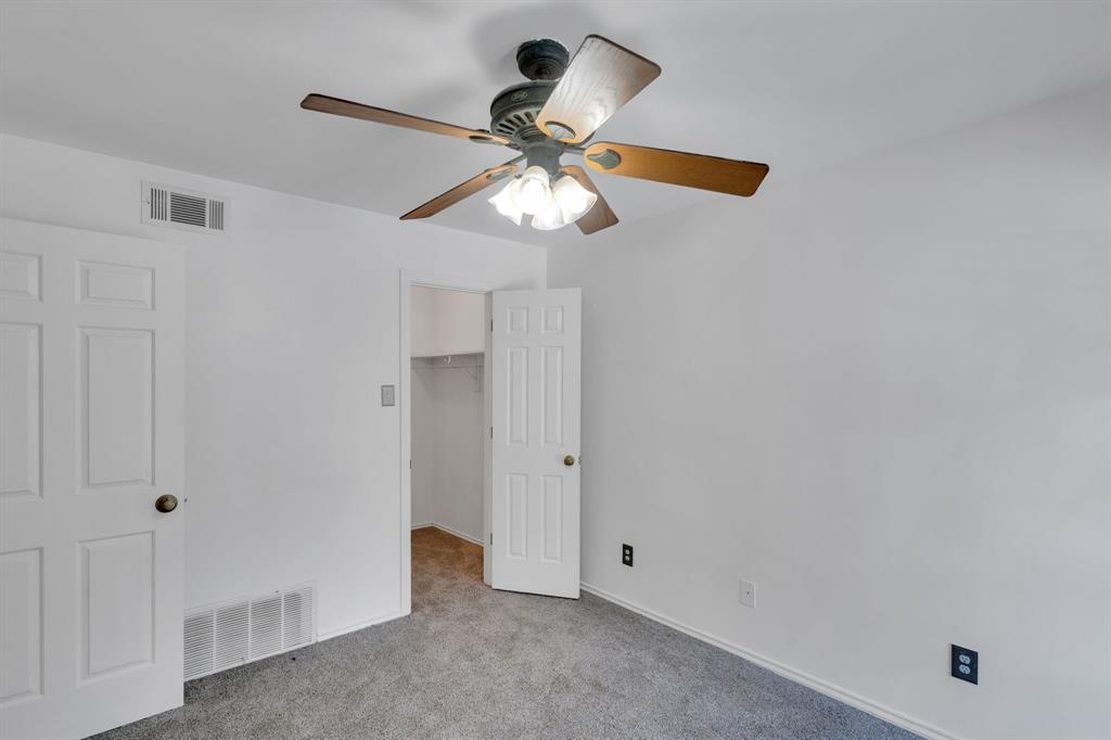 3206 South Fielder Road, Unit 209 Arlington, TX 76015 - Photo 20 of 22 a view of a chandelier fan in a room