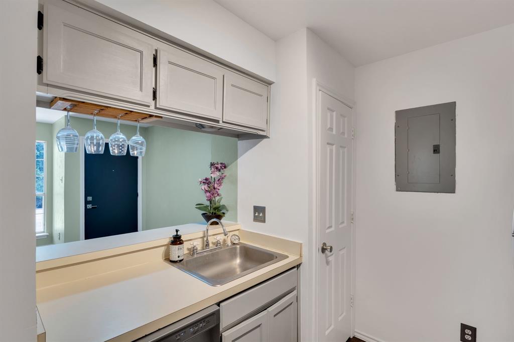 3206 South Fielder Road, Unit 209 Arlington, TX 76015 - Photo 9 of 22 a bathroom with a sink and a mirror