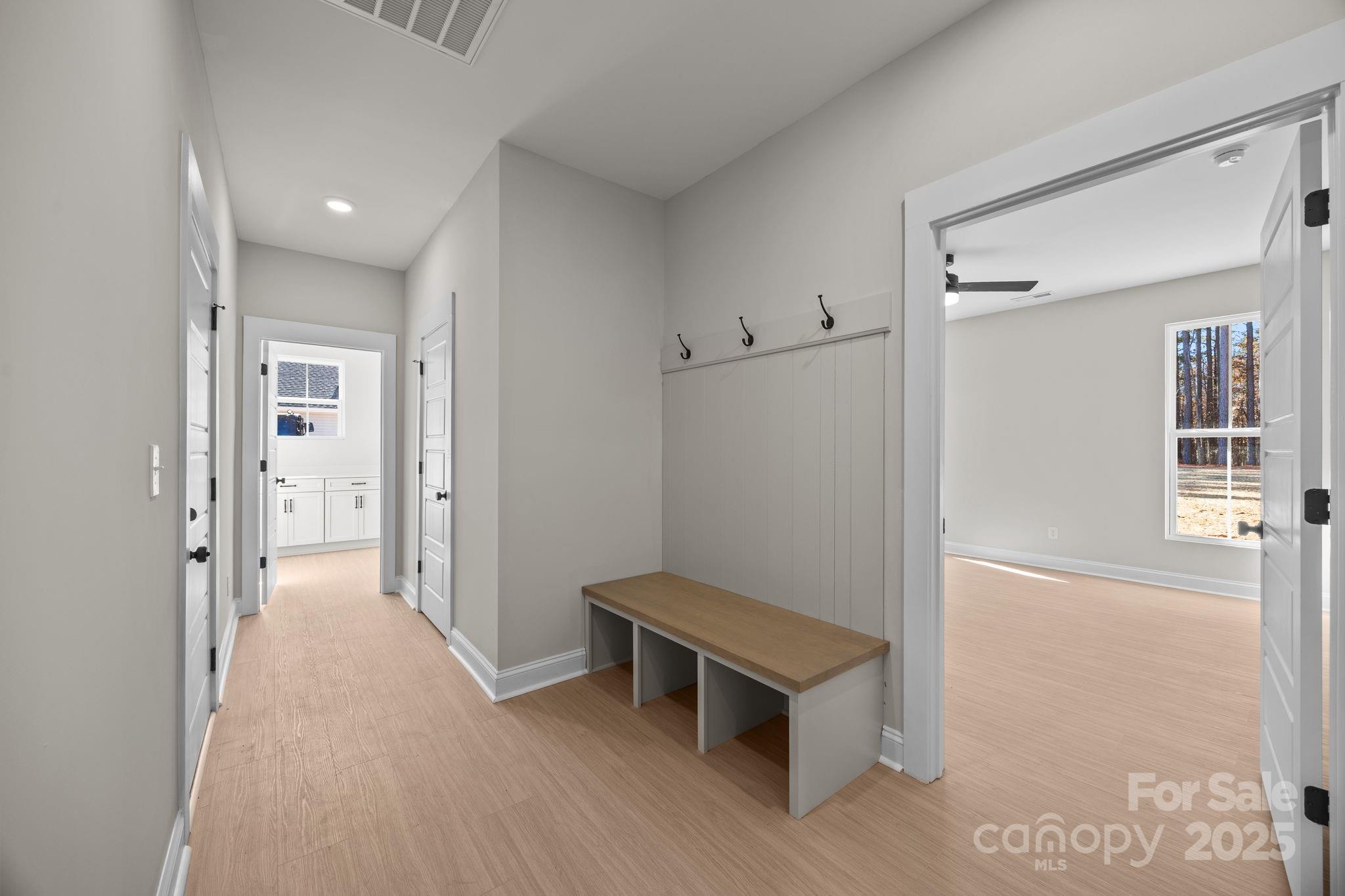 2295 Lee Lawing Road Lincolnton, NC 28092 - Photo 23 of 46 a view of a hallway to rooms and stairs