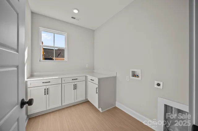 a hallway with windows