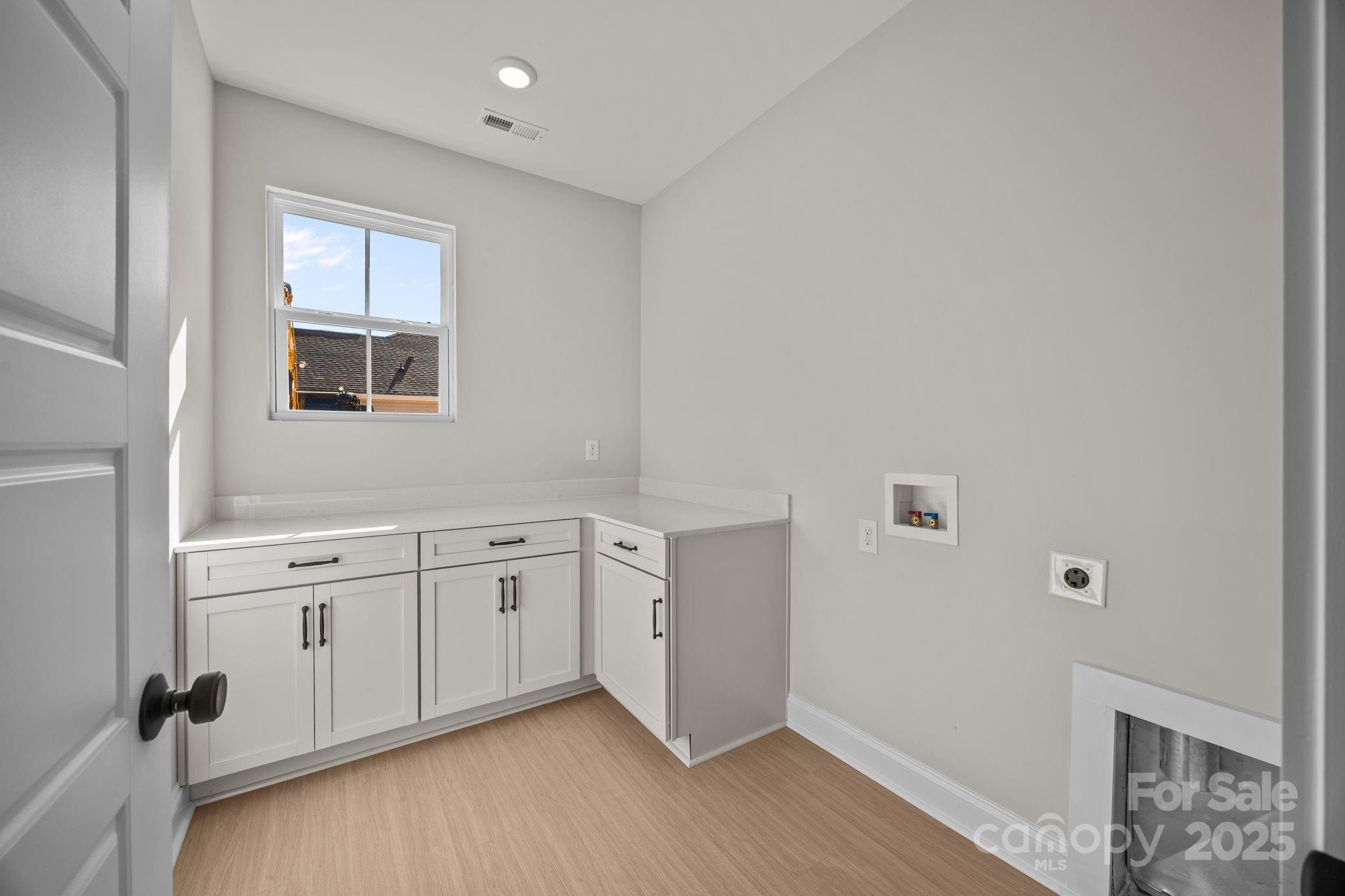 2295 Lee Lawing Road Lincolnton, NC 28092 - Photo 25 of 46 a hallway with windows