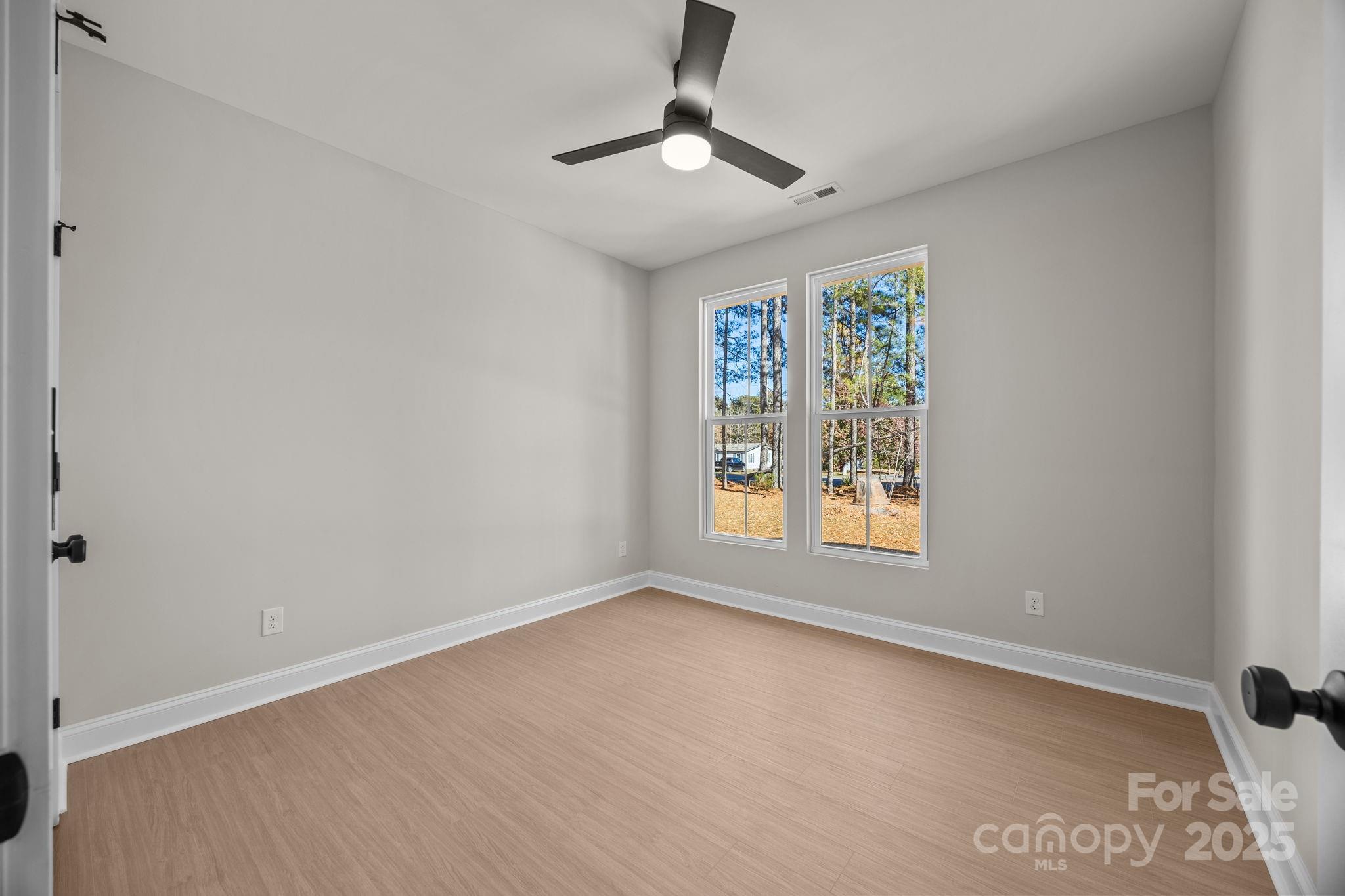 2295 Lee Lawing Road Lincolnton, NC 28092 - Photo 32 of 46 a view of an empty room with a window