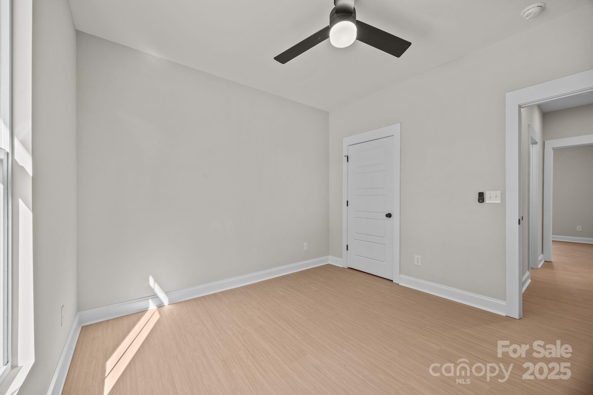 2295 Lee Lawing Road Lincolnton, NC 28092 - Photo 36 of 46 an empty room with a empty space and a ceiling fan