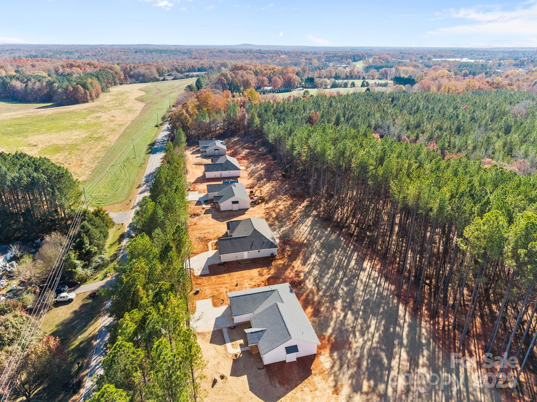 2295 Lee Lawing Road Lincolnton, NC 28092 - Photo 43 of 46 an aerial view of residential houses with outdoor space and ocean view