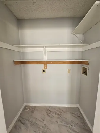 a view of a room with racks on the wall