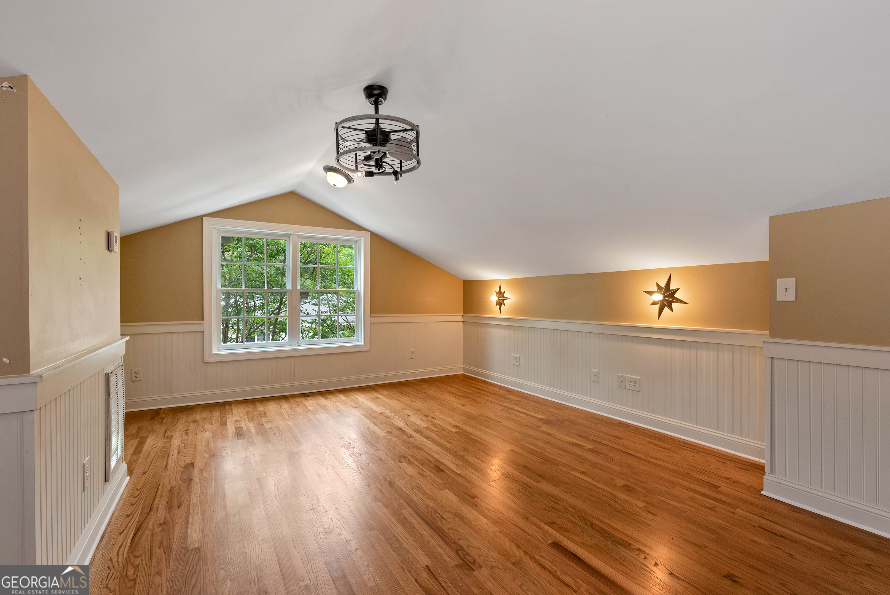952 Wayside Street Northwest Cornelia, GA 30531 - Photo 44 of 70 a view of a room with a window and wooden floor