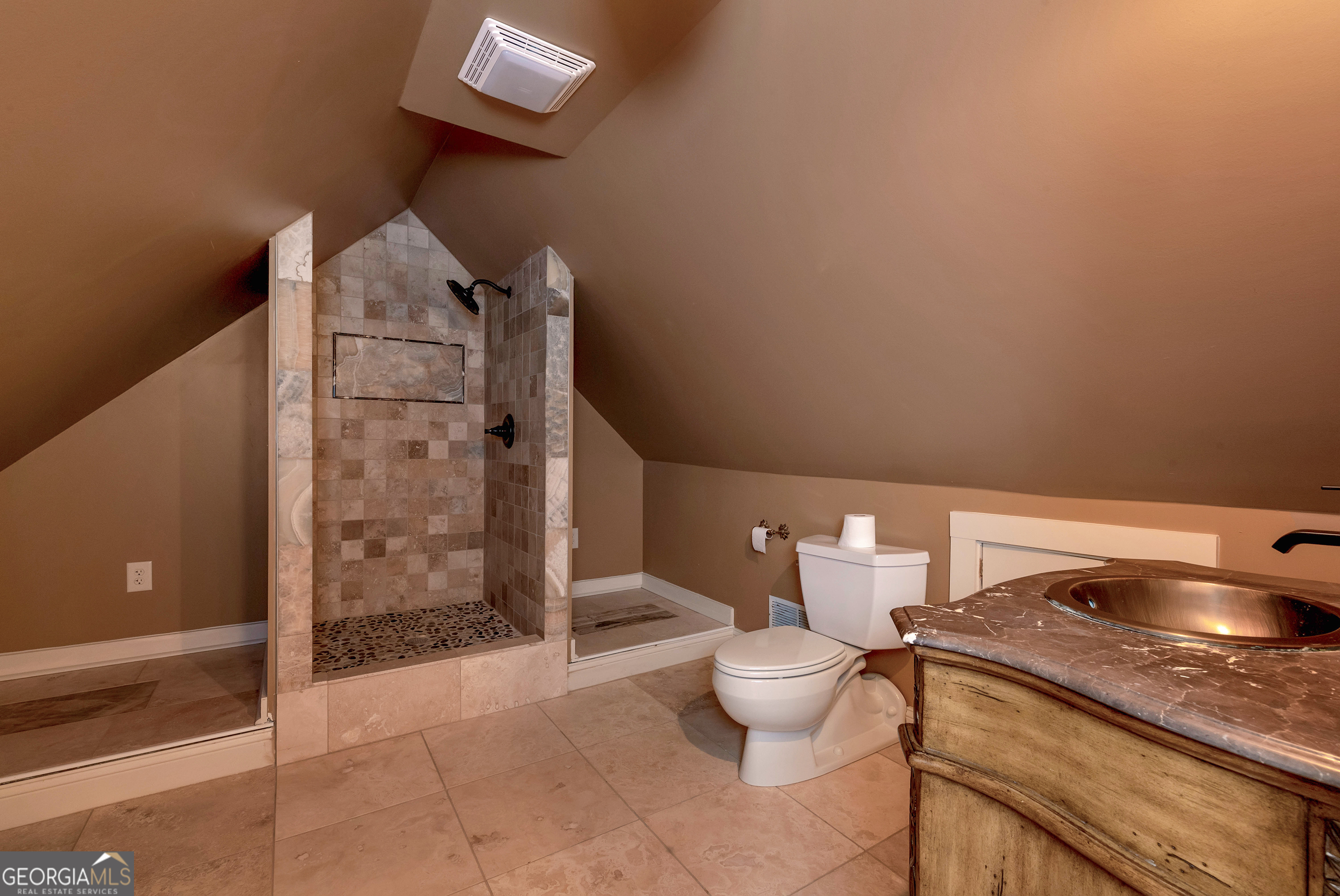 952 Wayside Street Northwest Cornelia, GA 30531 - Photo 47 of 70 a bathroom with a granite countertop sink a toilet and shower