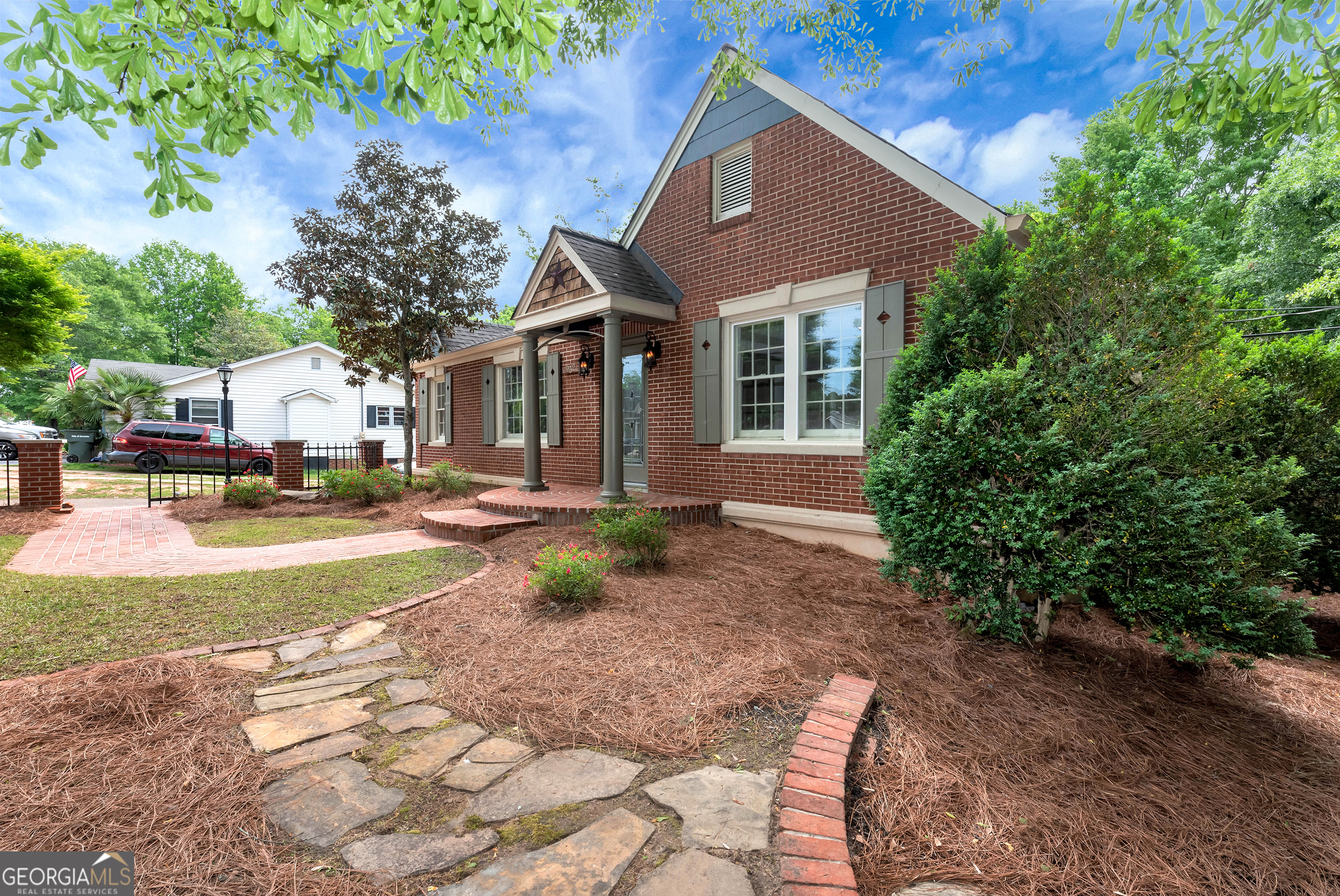 952 Wayside Street Northwest Cornelia, GA 30531 - Photo 58 of 70 a front view of a house with a yard