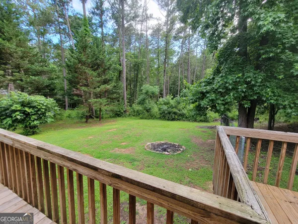 a view of a two chairs in the deck