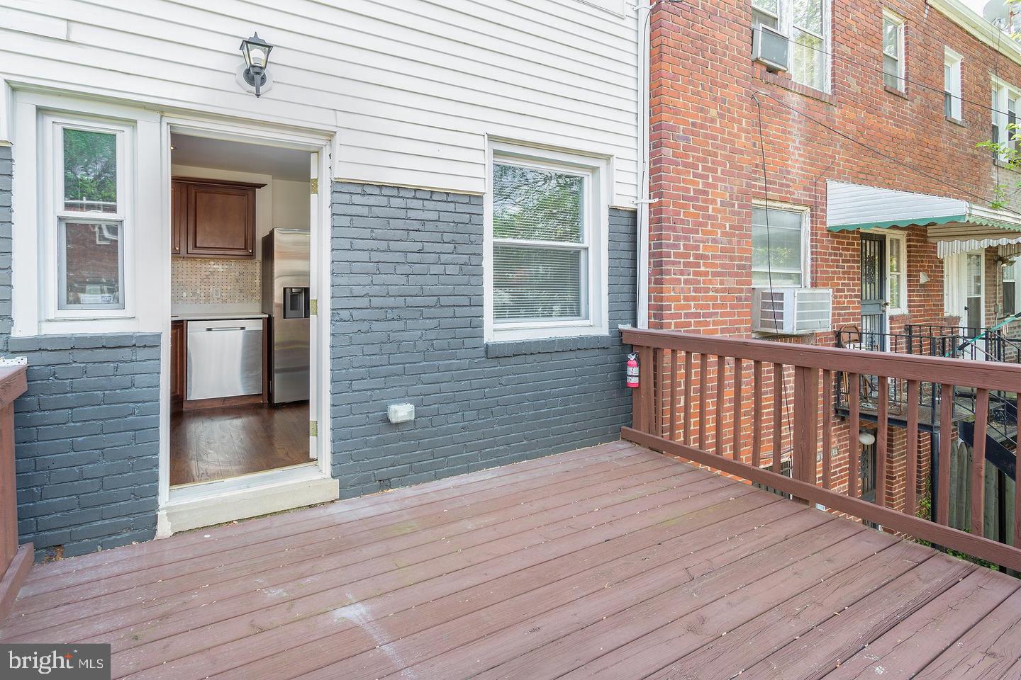1622 Ridge Place Southeast Washington, DC 20020 - Photo 18 of 27 a view of backyard with a wooden deck