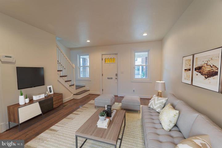 1622 Ridge Place Southeast Washington, DC 20020 - Photo 2 of 27 a living room with furniture and a flat screen tv