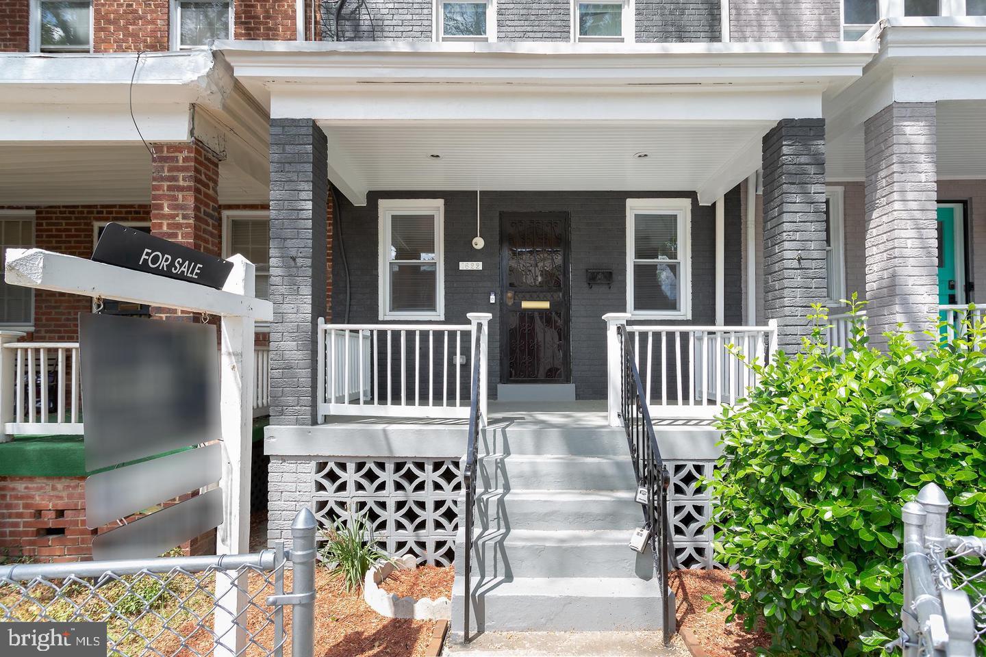 1622 Ridge Place Southeast Washington, DC 20020 - Photo 22 of 27 a view of a house with a window and wooden fence
