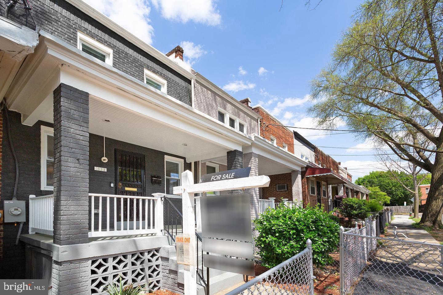1622 Ridge Place Southeast Washington, DC 20020 - Photo 23 of 27 a front view of a house with a tree