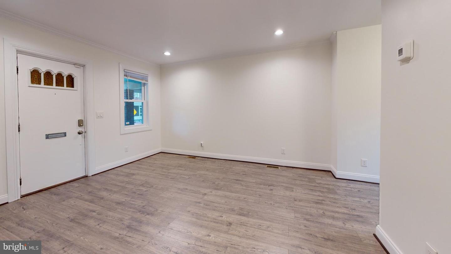 1622 Ridge Place Southeast Washington, DC 20020 - Photo 10 of 27 a view of an empty room with a window