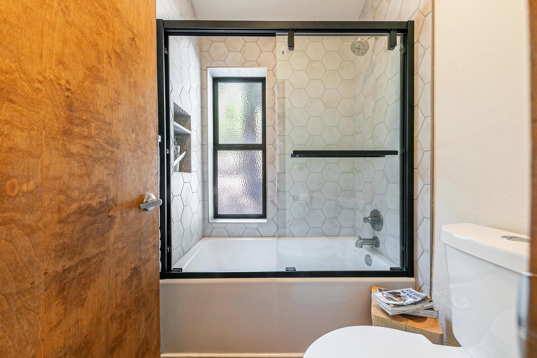 3003 Meadow Court, Unit 5 Olympic Valley, CA 96146 - Photo 13 of 28 a bathroom with a granite countertop window and a shower